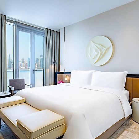Hotel Mandarin Oriental, Ad Dawhah Esterno foto A bedroom at the hotel